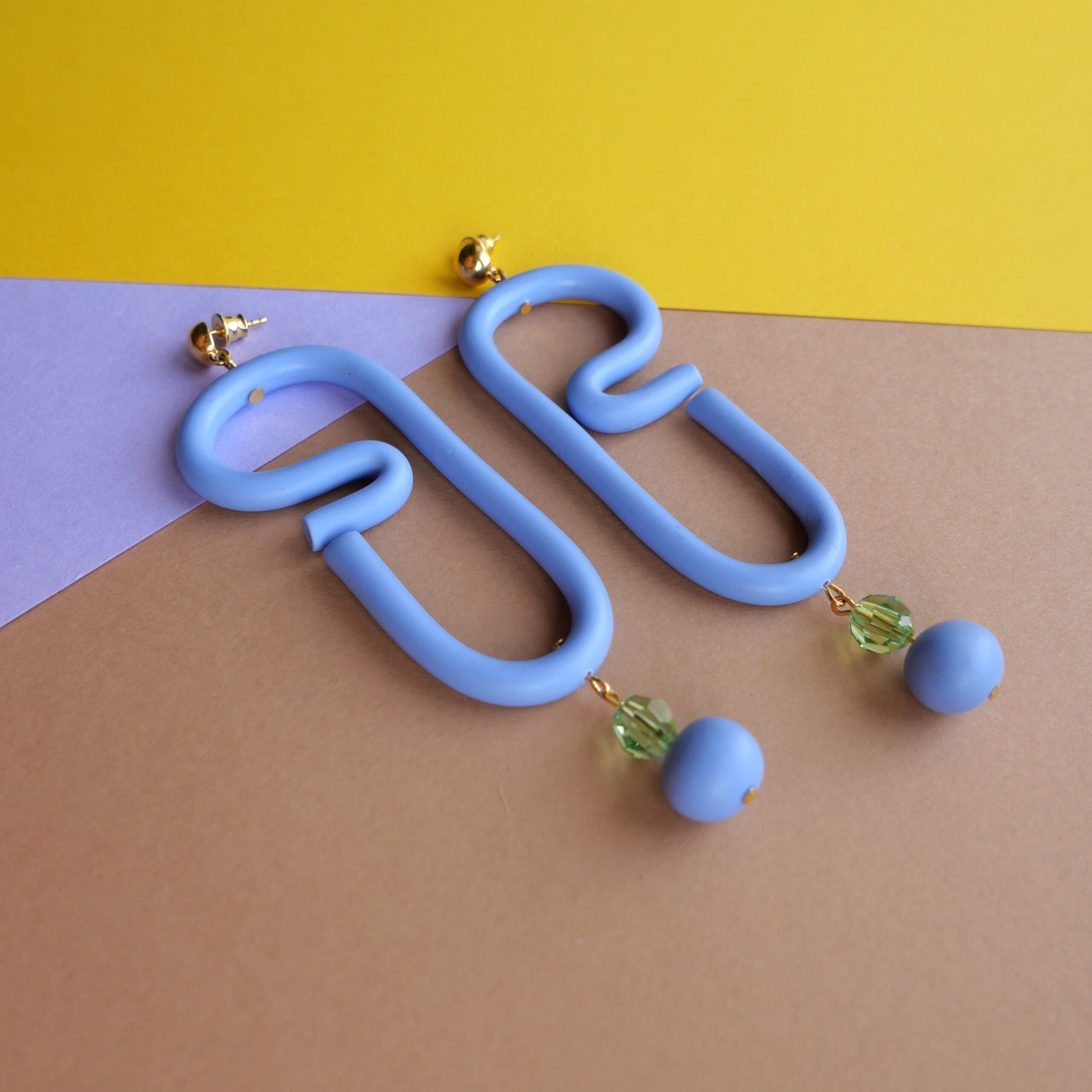 colourful earrings curl ocean